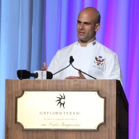 Sam 
Kass