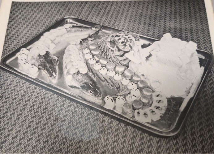 A tray of food on a table.