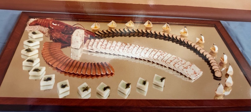 A display of various objects on a glass surface.