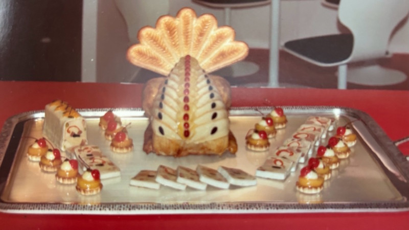 A turkey shaped food on a tray.