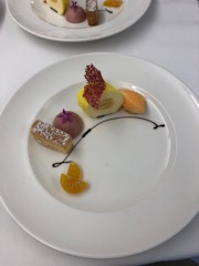 A plate of desserts on a table.