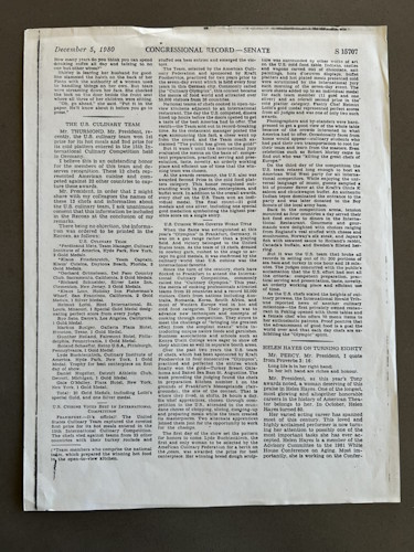 A newspaper with text on it.