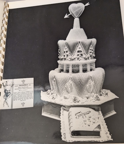 A black and white photo of a cake.