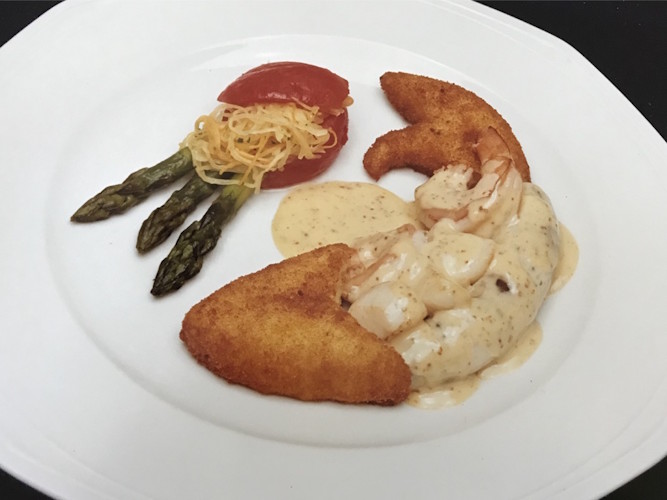 A plate of food on a white plate.